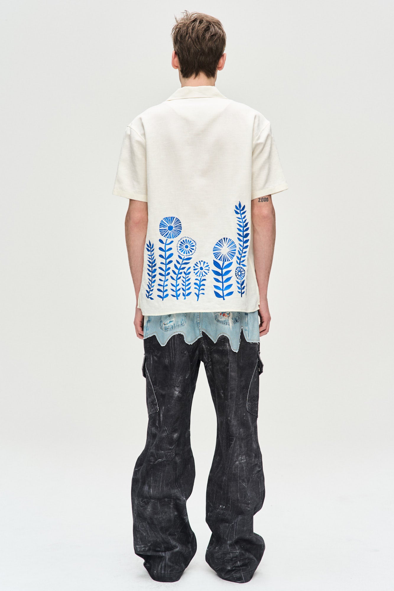 FAUX-DENIM & SCRATCH LEATHER PRINTED CARGO-PANTS